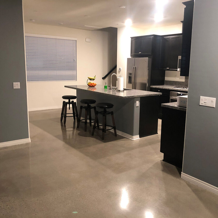 Modern kitchen with island and three stools